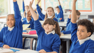Children answering questions in class